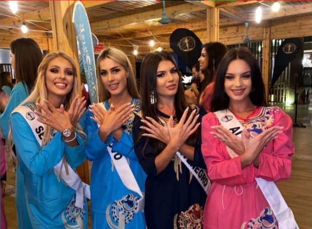 Skandal: Euforične misice Crne Gore, Albanije, Srbije i tzv. Kosova pokazivale velikoalbanskog dvoglavog orla; Srpkinja se izvinila i povukla sa smotre!