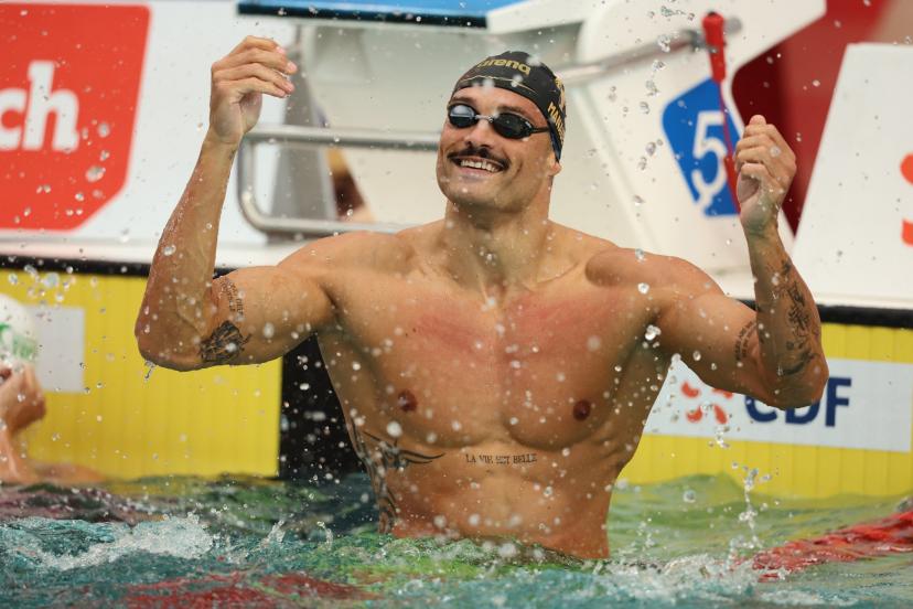Rober Mišon i Manadu nose zastavu domaćina na Olimpijskim igrama