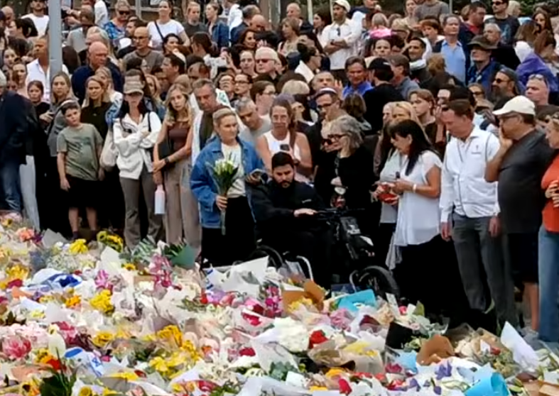 Screenshot 2025-12-16 at 09-03-25 (98) LIVE Bondi Beach shooting memorial in Australia – YouTube